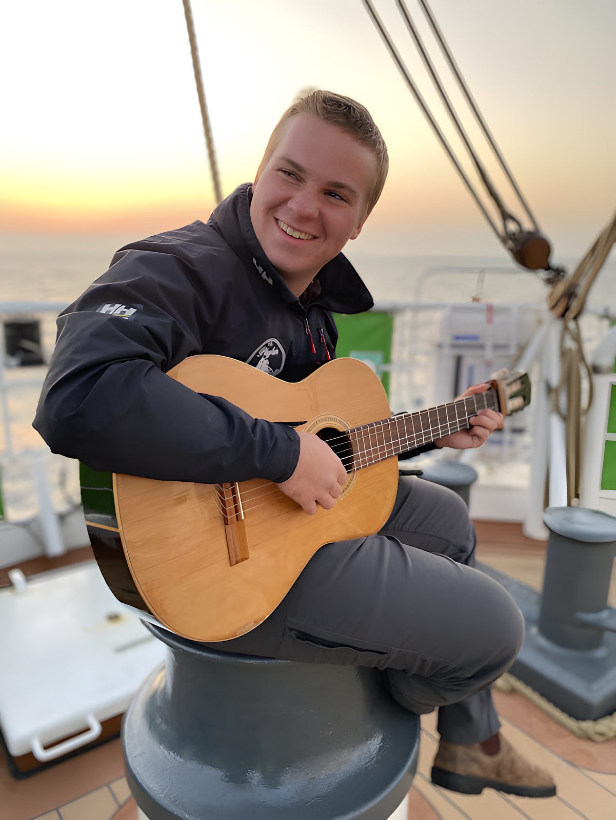 Sunset session: Guitar on the foredeck, Alexander von Humboldt II, March 2022