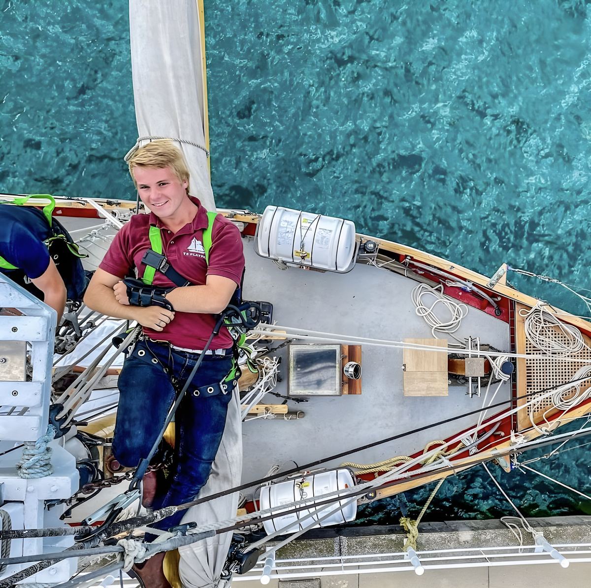 Connor aloft on TS Playfair, looking down on the deck